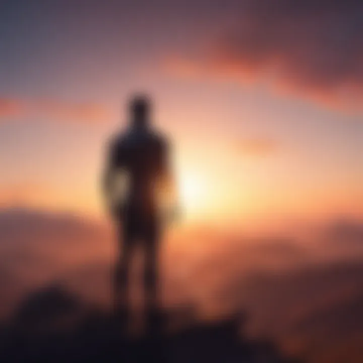 Silhouetted figure standing on mountaintop gazing at sunrise