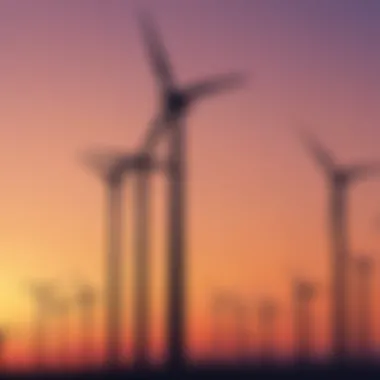 Wind farm at sunset with multiple turbines in silhouette